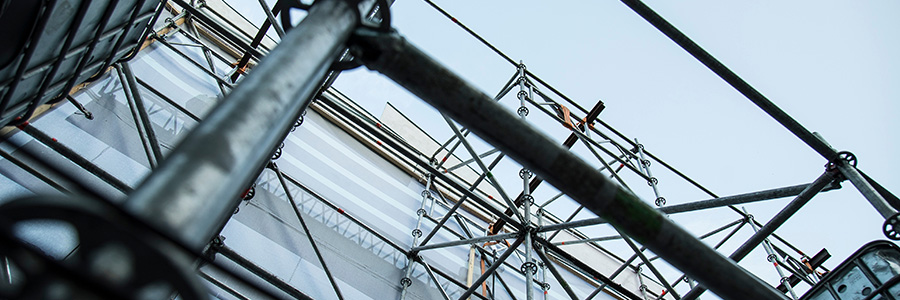 Metal girder extensive scaffolding providing platforms for stage structure support